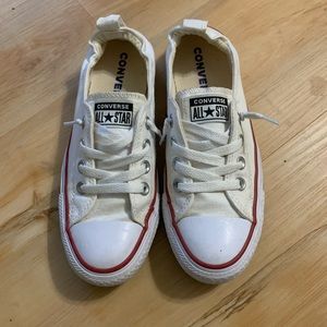 white slip on converse